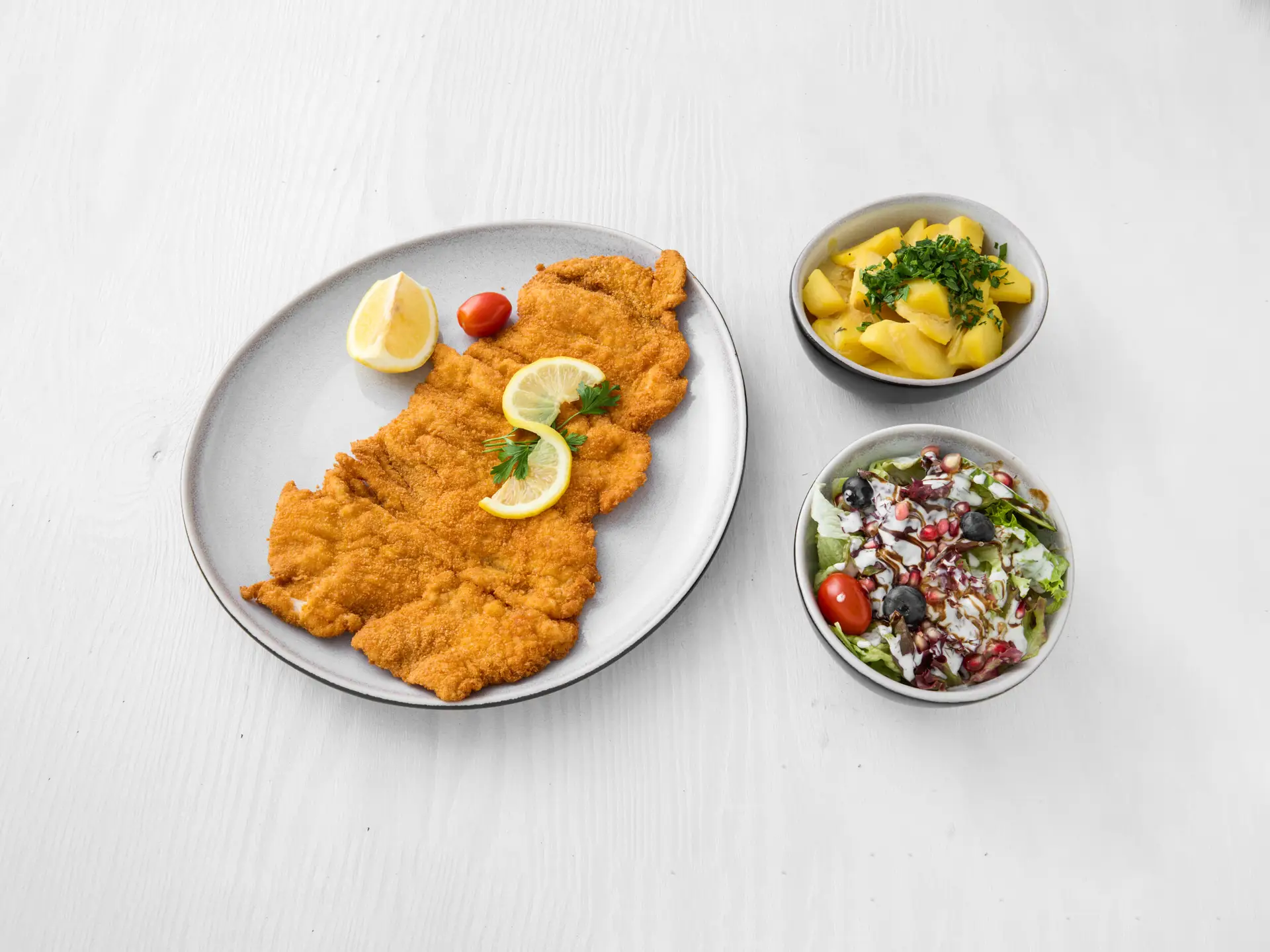 10253693_wilder kaiser_Food_putenschnitzel_kartoffelsalat