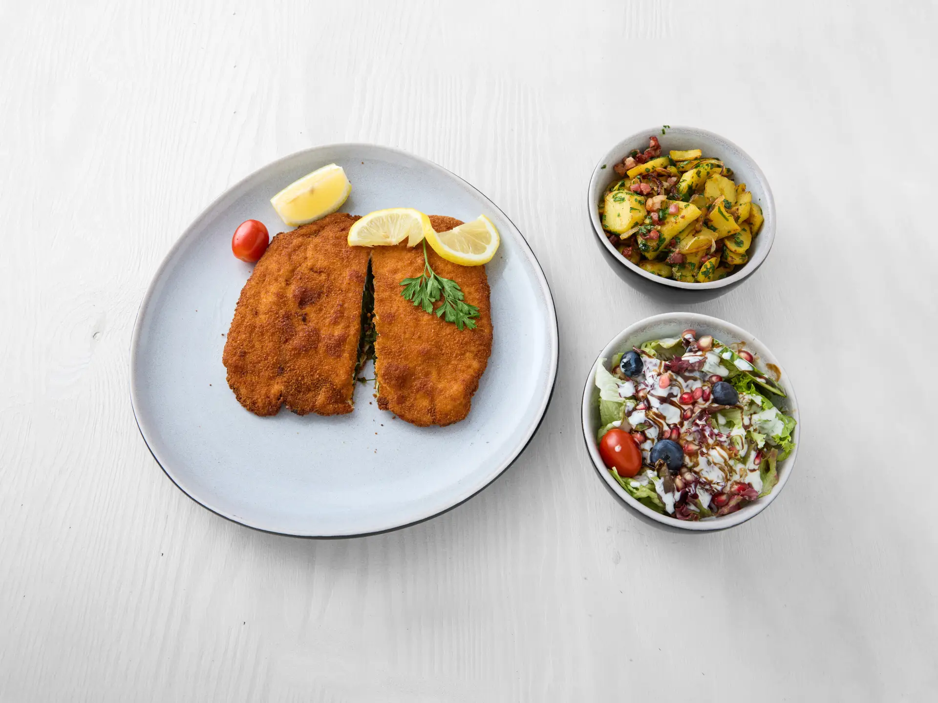 10253693_wilder kaiser_Food_schnitzel_gefullt_blattspinat_chili_bratkartoffeln